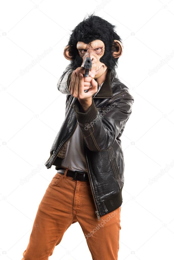 Monkey man holding a pistol