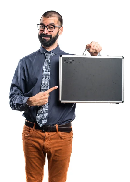 Homem segurando uma mala — Fotografia de Stock