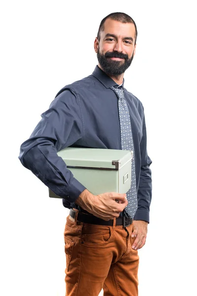 Hombre sosteniendo una caja —  Fotos de Stock