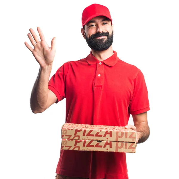 Uomo consegna pizza saluti — Foto Stock