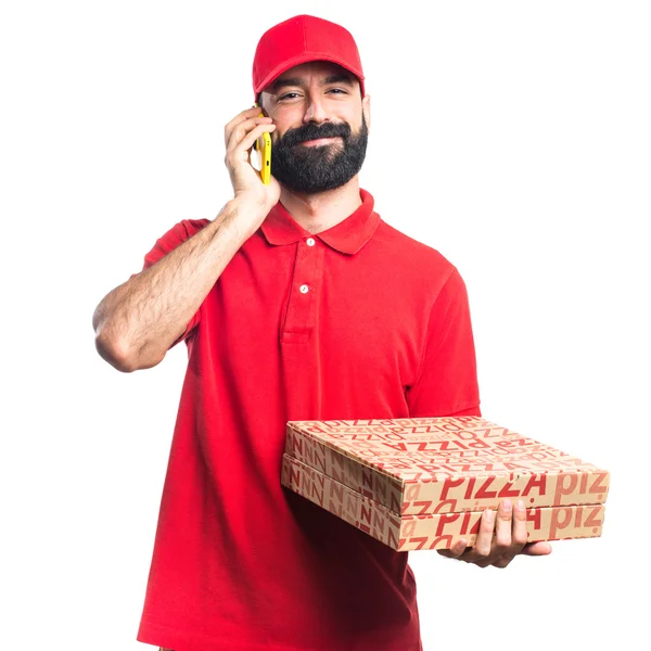 Pizzabote spricht mit Handy — Stockfoto