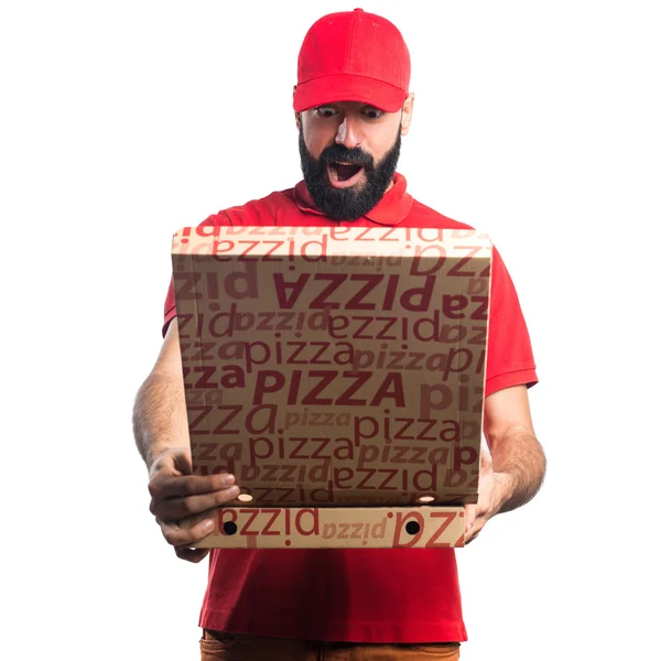 Pizza levering man doen verrassing gebaar — Stockfoto