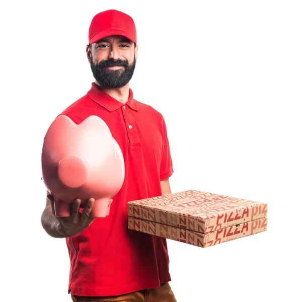 Pizza levering man met een spaarpot — Stockfoto