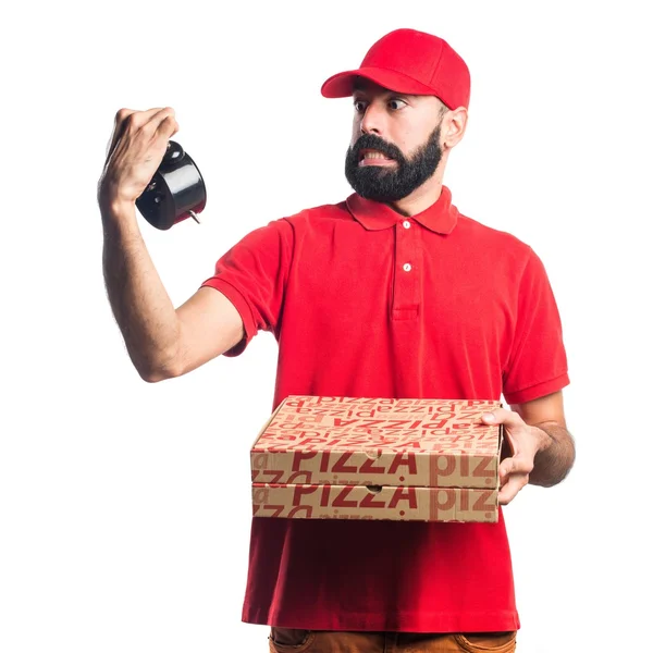 Homem de entrega de pizza segurando relógio vintage — Fotografia de Stock