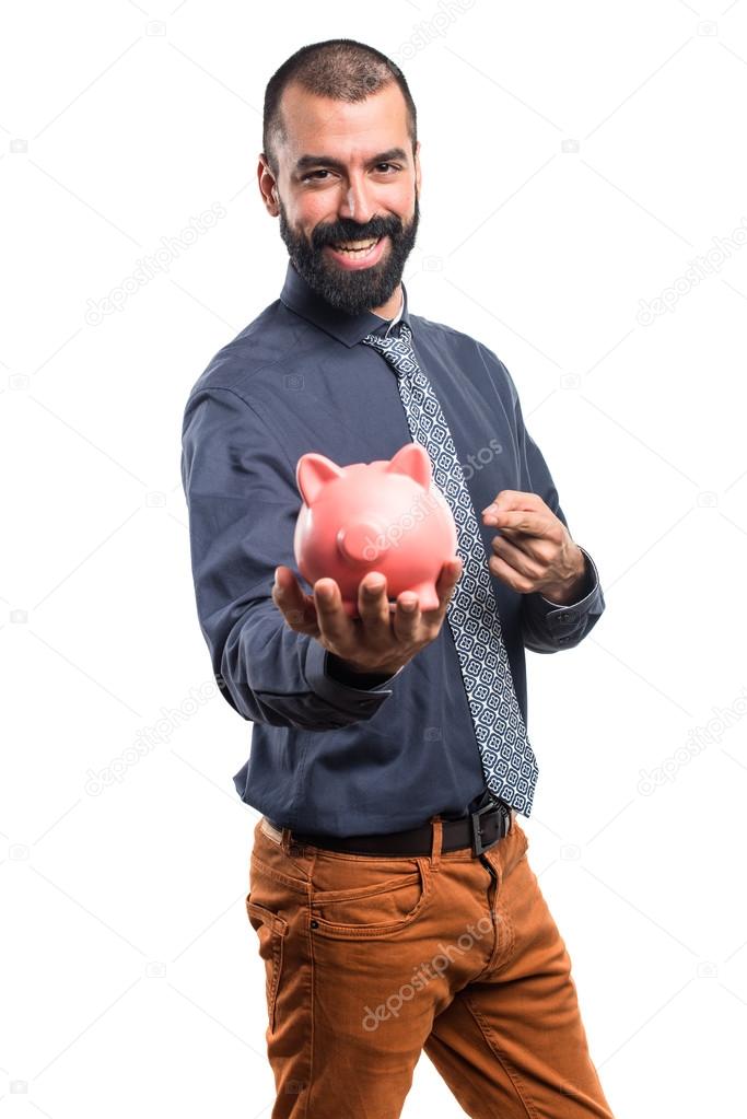 Man holding a piggybank