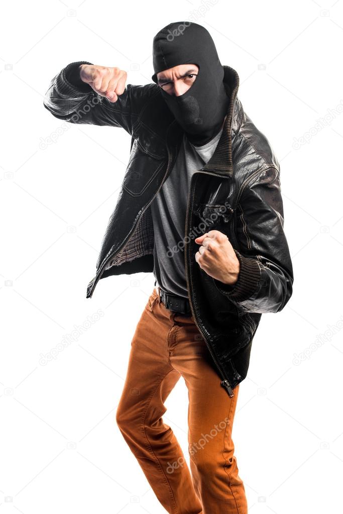 Robber giving a punch