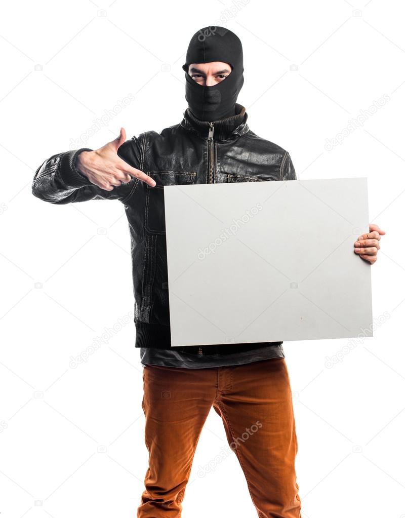 Robber holding an empty placard