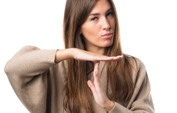 Flicka gör time out gest — Stockfoto