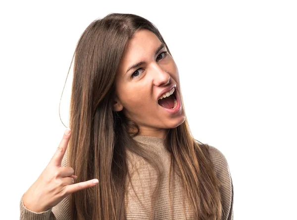 Chica haciendo gesto cuerno — Foto de Stock