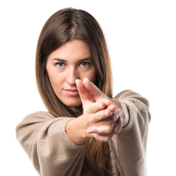 Girl making gun gesture — Stock Photo, Image