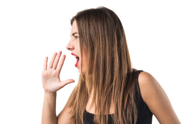 Bella ragazza in oltre ocra sfondo — Foto Stock