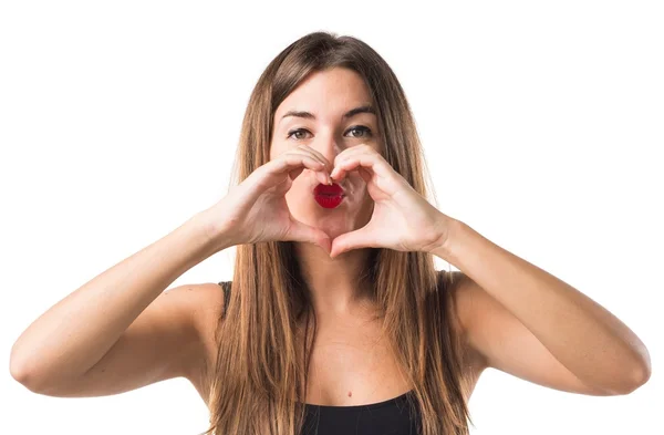 Bella ragazza in oltre ocra sfondo — Foto Stock