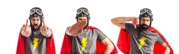 Superhero doing bad signal — Stock Photo, Image