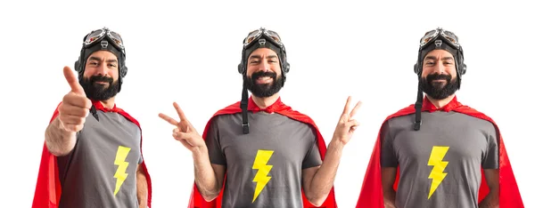 Супергерой делает победный жест — стоковое фото