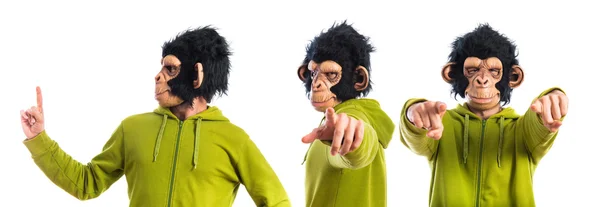 Hombre mono señalando hacia el frente — Foto de Stock