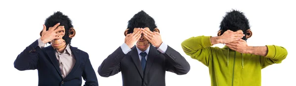 Monkey man covering his eyes — Stock Photo, Image