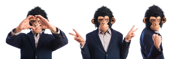 Monkey man doing victory gesture — Stock Photo, Image