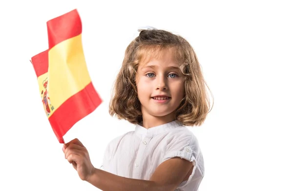 Kid hålla en spansk flagg — Stockfoto