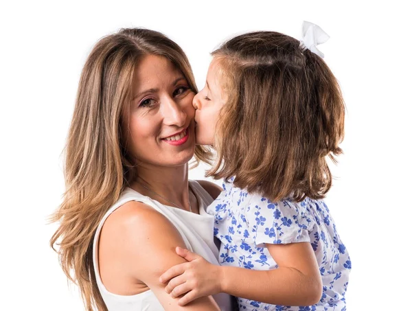 Daughter kissing her mother — Stock Photo, Image