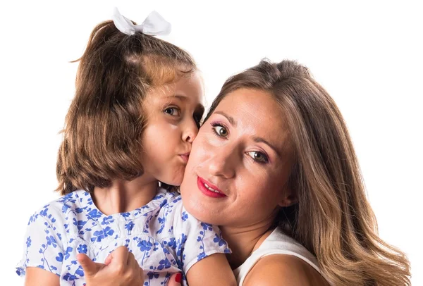 Daughter kissing her mother — Stock Photo, Image