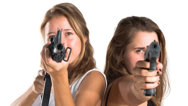 Friends holding a SMG and a gun — Stock Photo, Image