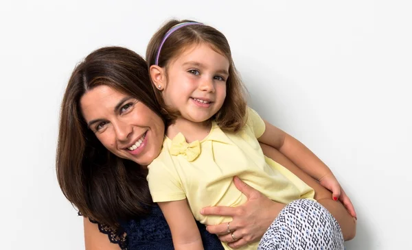 Mother and daughter in studio — Stock Photo, Image