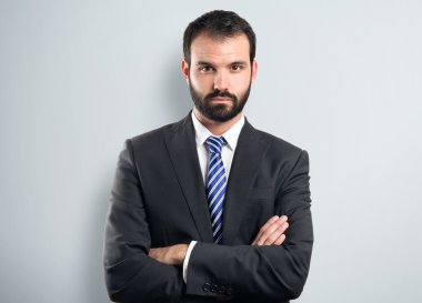 kollarını ile iş adamı izole arka plan üzerinde çarpı işareti 