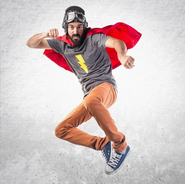 Superheld geven een punch — Stockfoto