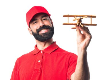 Pizza teslimi adam ahşap oyuncak uçak holding