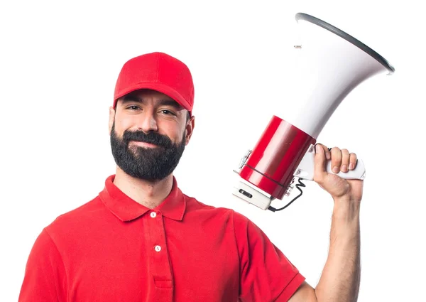 Pizza delivery man shouting by megaphone — Stock Photo, Image