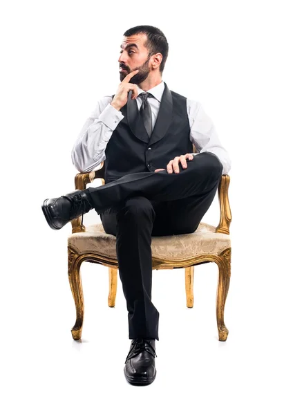 肘掛け椅子に座っての実業家 — ストック写真