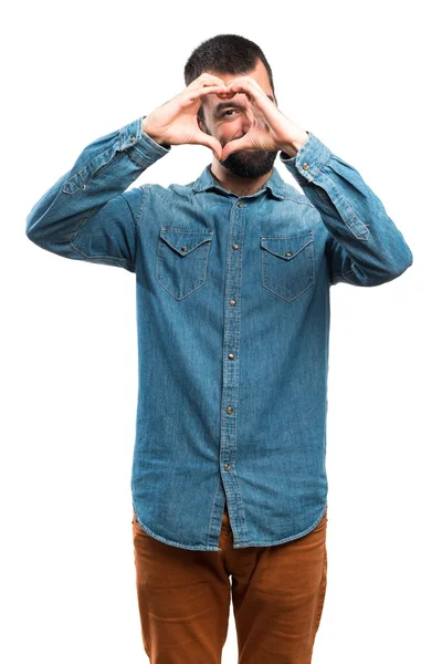 Man making a heart with his hands — Stock Photo, Image