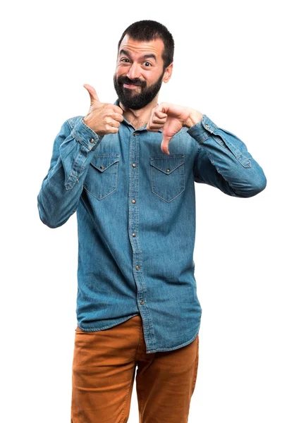 Man making good-bad sign — Stock Photo, Image