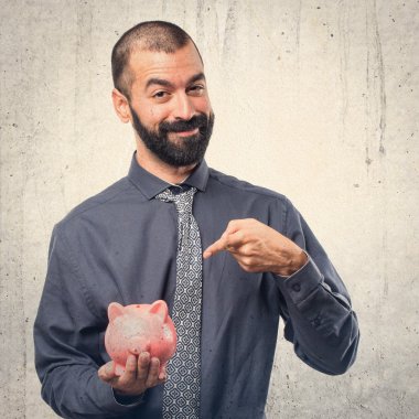 Bir servet tutan adam