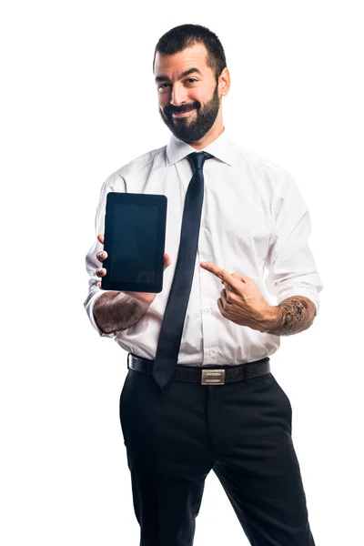 Empresario sosteniendo una tableta —  Fotos de Stock