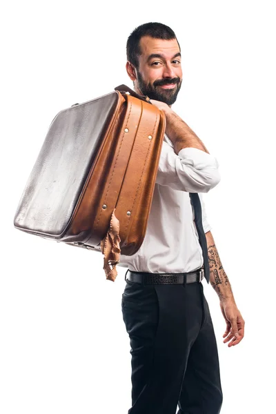 Businessman holding a briefcase Royalty Free Stock Photos