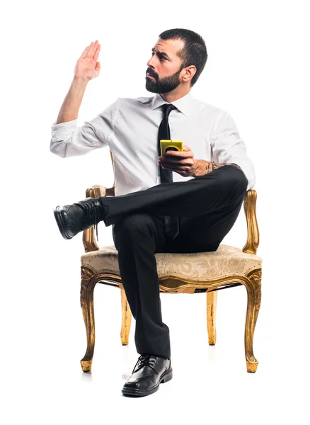 Businessman talking to mobile — Stock Photo, Image