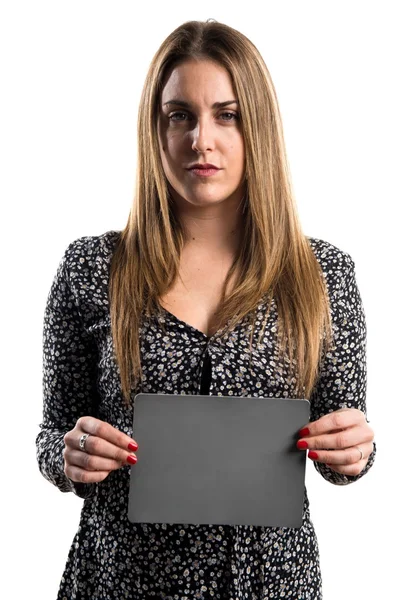 Blonde woman holding an empty placard — Stock Photo, Image