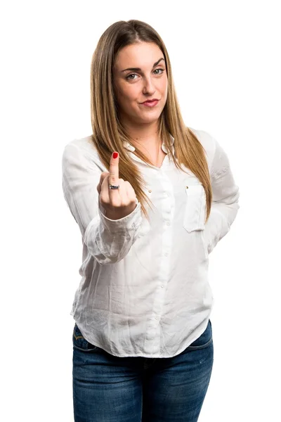 Blonde woman making horn gesture — Stock Photo, Image