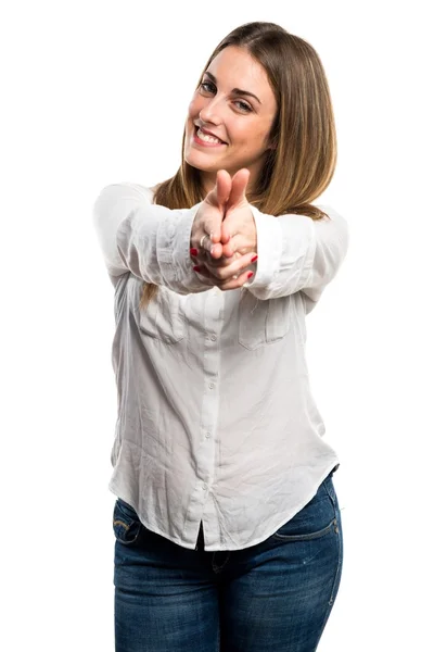 Blonde woman making gun gesture — Stock Photo, Image