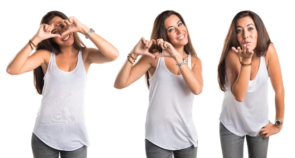 Woman making a heart with her hands — Stock Photo, Image