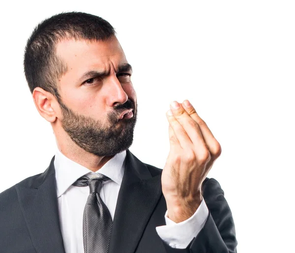 Businessman doing a money gesture — Stock Photo, Image