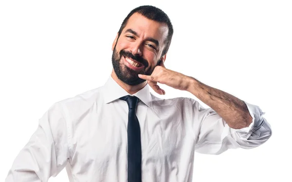 Empresário fazendo gesto de telefone — Fotografia de Stock