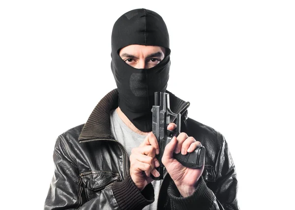 Rånare skytte med en pistol — Stockfoto
