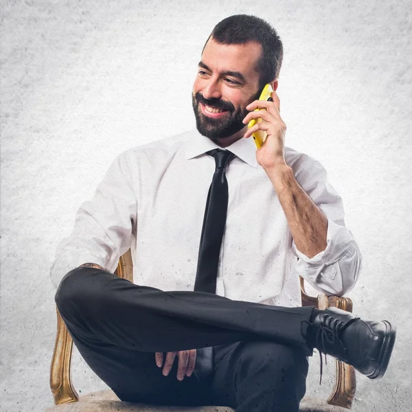 Businessman talking to mobile — Stock Photo, Image