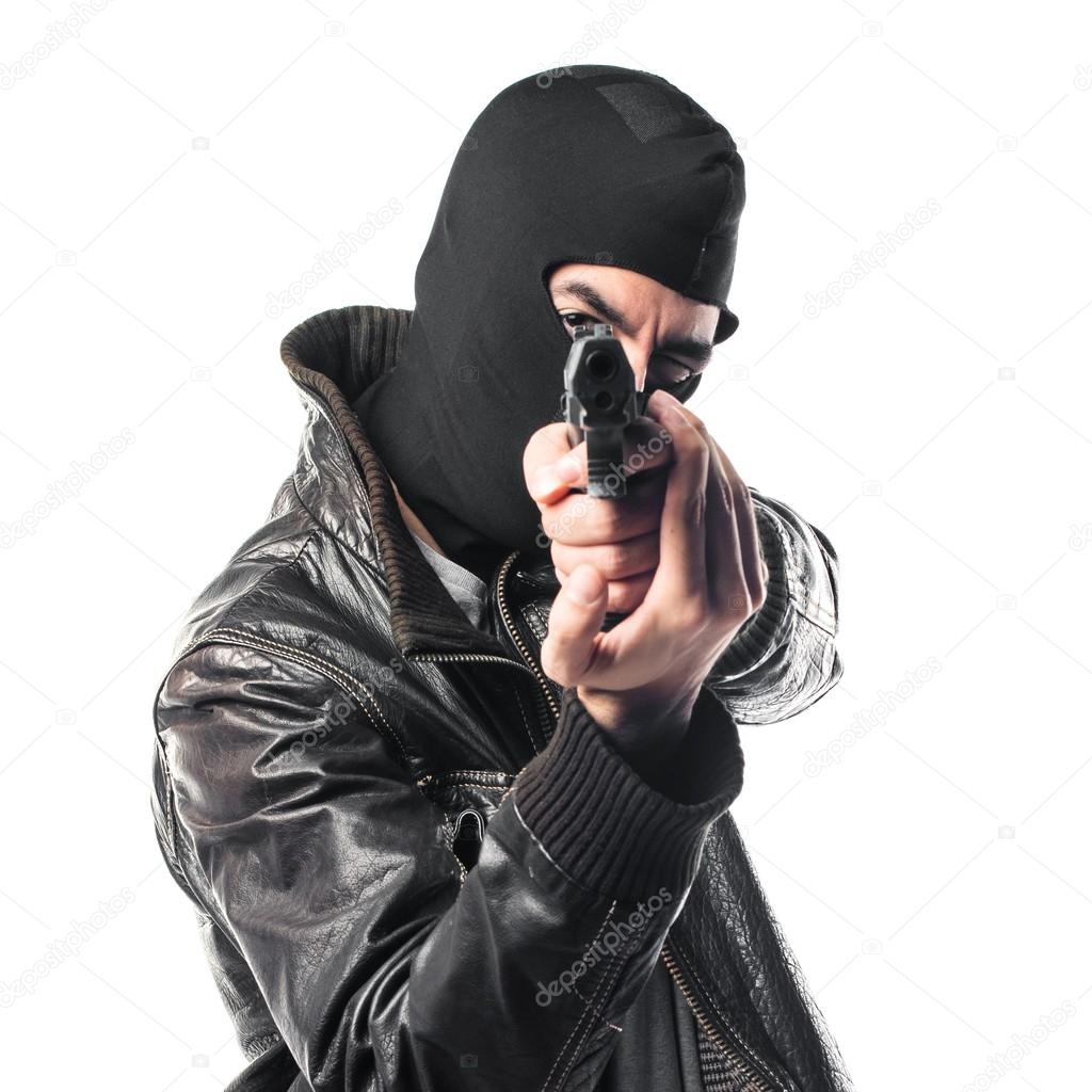Robber shooting with a pistol