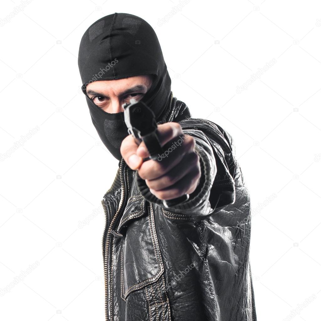 Robber shooting with a pistol