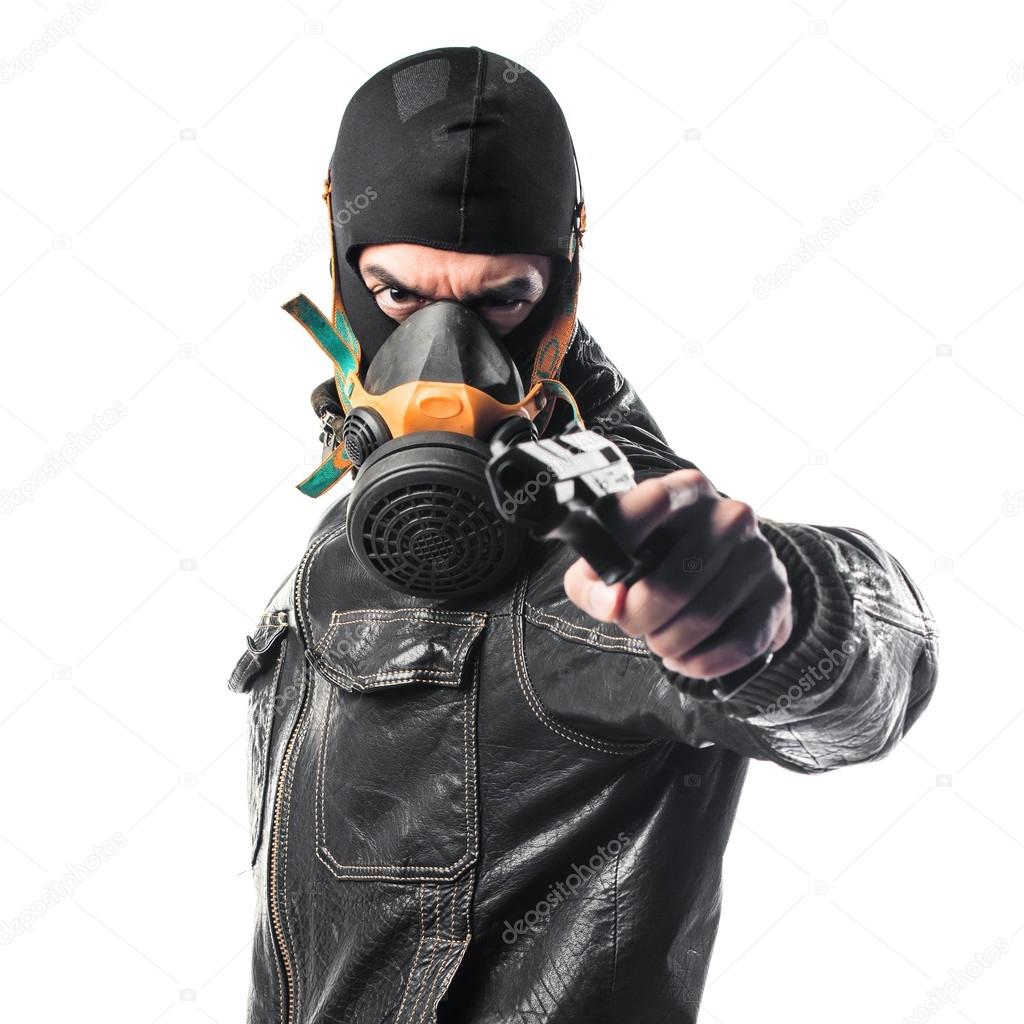 Robber holding a pistol