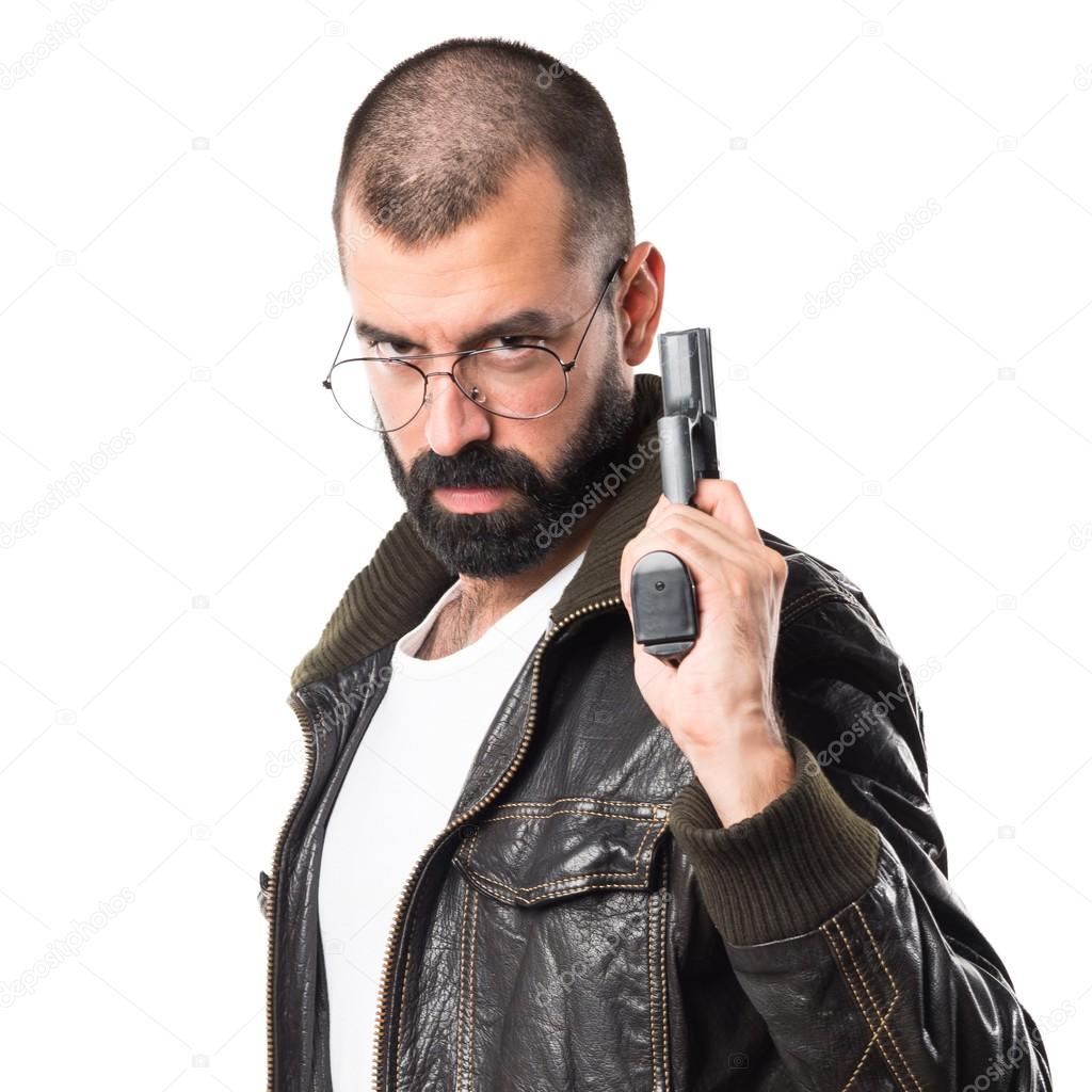 Pimp man holding a pistol