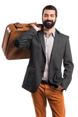 Elinde evrak çantası olan bir adam.